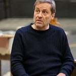 Ardal O'Hanlon sits in a black jumper.