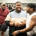 Kyle Ramar Freeman leading the cast in a scene, in rehearsals for A Strange Loop.