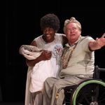 Garry Robson, in a wheelchair, as Cleon with a cast member in Pericles.